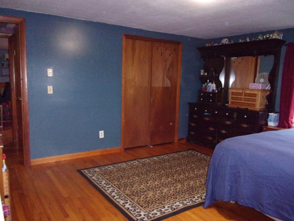 145 Main Road Westhampton, MA 01027 - Photo 26 of 30 a bedroom with a bed and a dresser