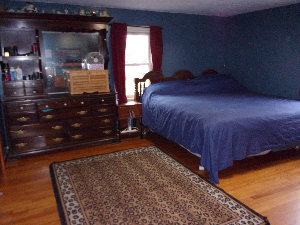 145 Main Road Westhampton, MA 01027 - Photo 27 of 30 a bedroom with a bed window and dresser