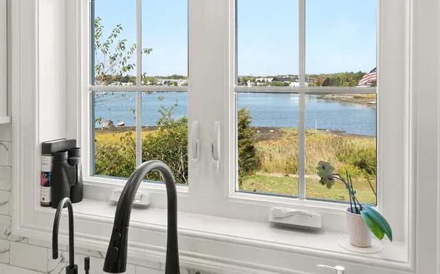 a view of balcony with furniture