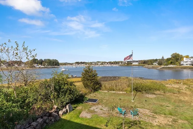 a view of an ocean with city