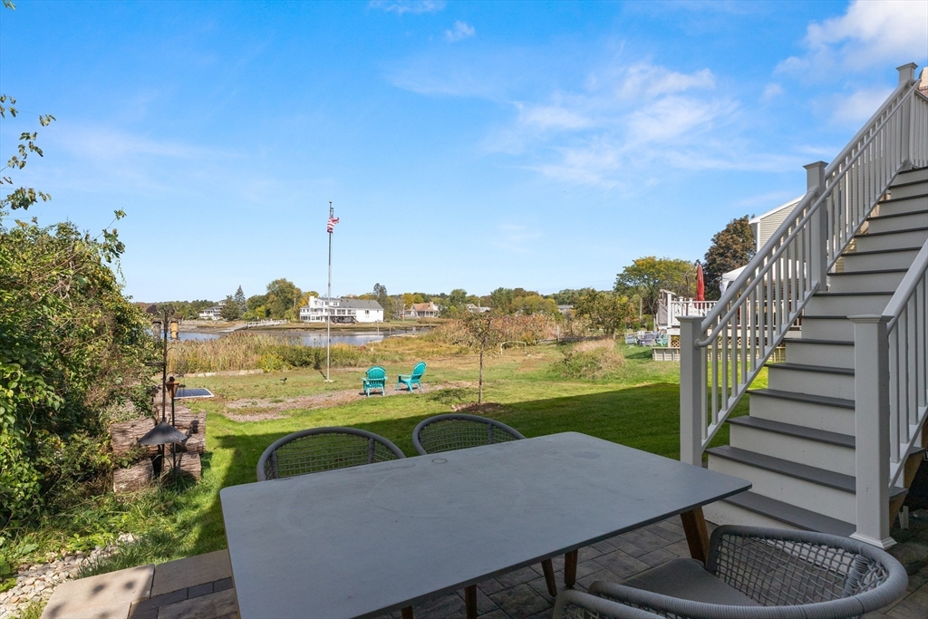 59 Riverview Avenue Danvers, MA 01923 - Photo 30 of 35 a view of a chairs and table on the terrace