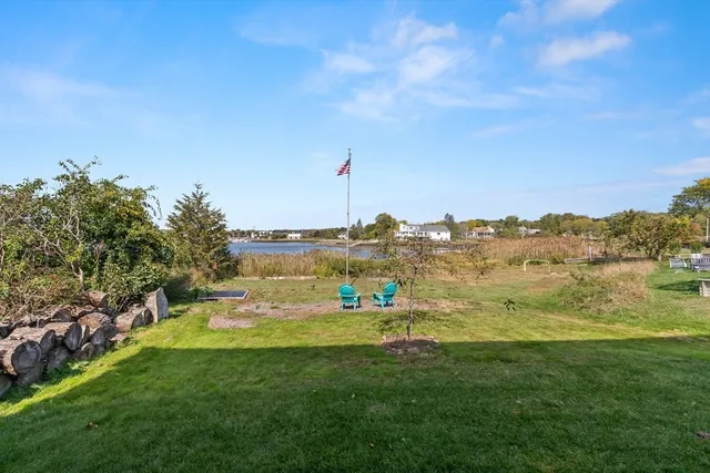 a view of a town with mountains in the background