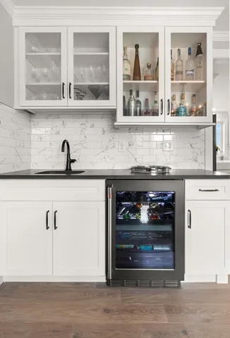 a kitchen with a stove and a cabinet