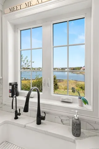 a room with gym equipment and a large window