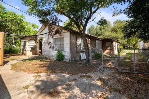 228 Southwest 8th Street Premont, TX 78375 - Photo 17 of 19 a front view of a house with a yard