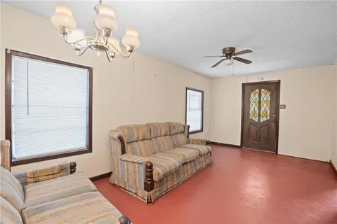 228 Southwest 8th Street Premont, TX 78375 - Photo 4 of 19 a living room with furniture and a window