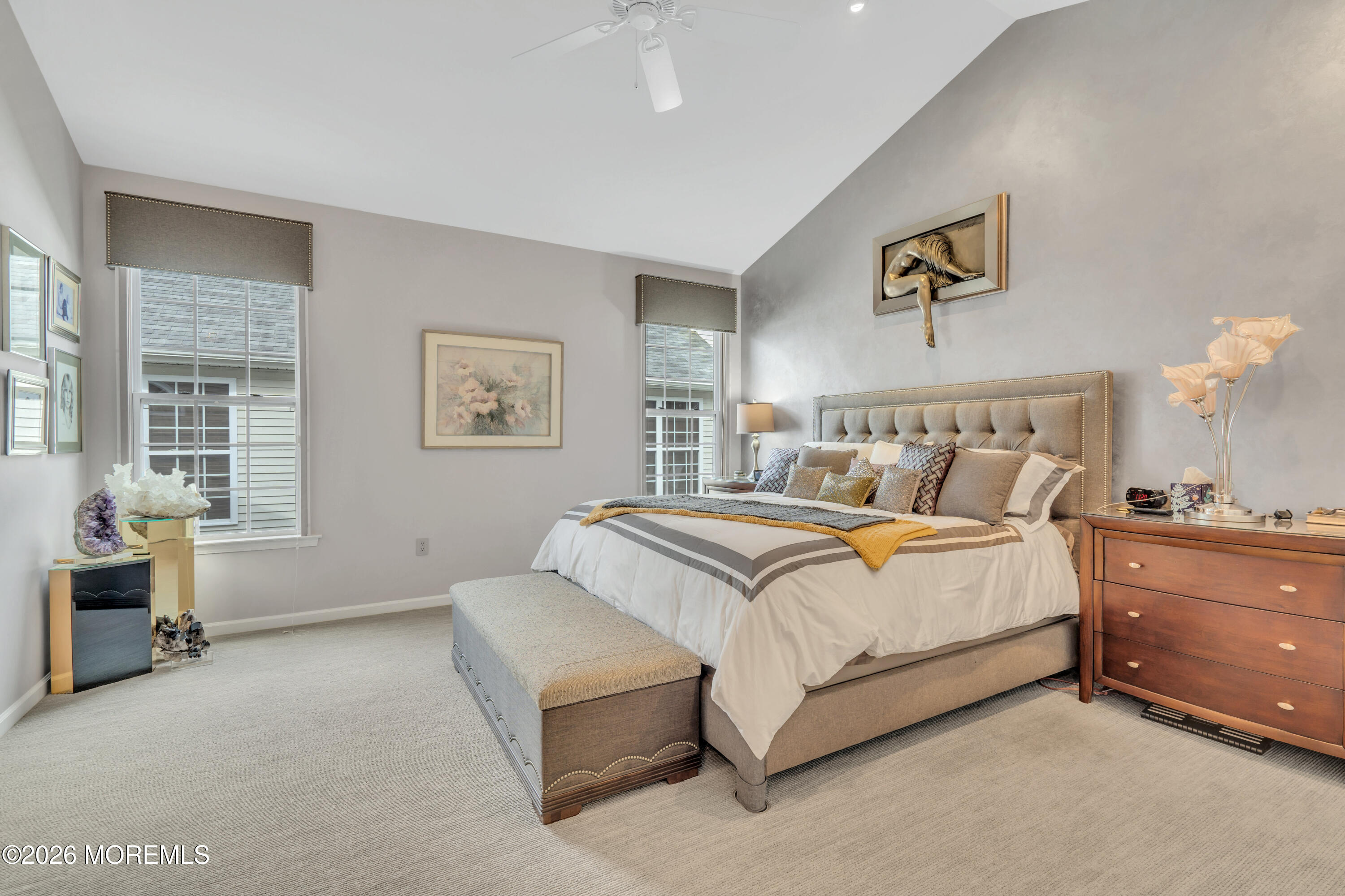 15 Enclave Boulevard Lakewood, NJ 08701 - Photo 22 of 81 a spacious bedroom with a bed and a couch