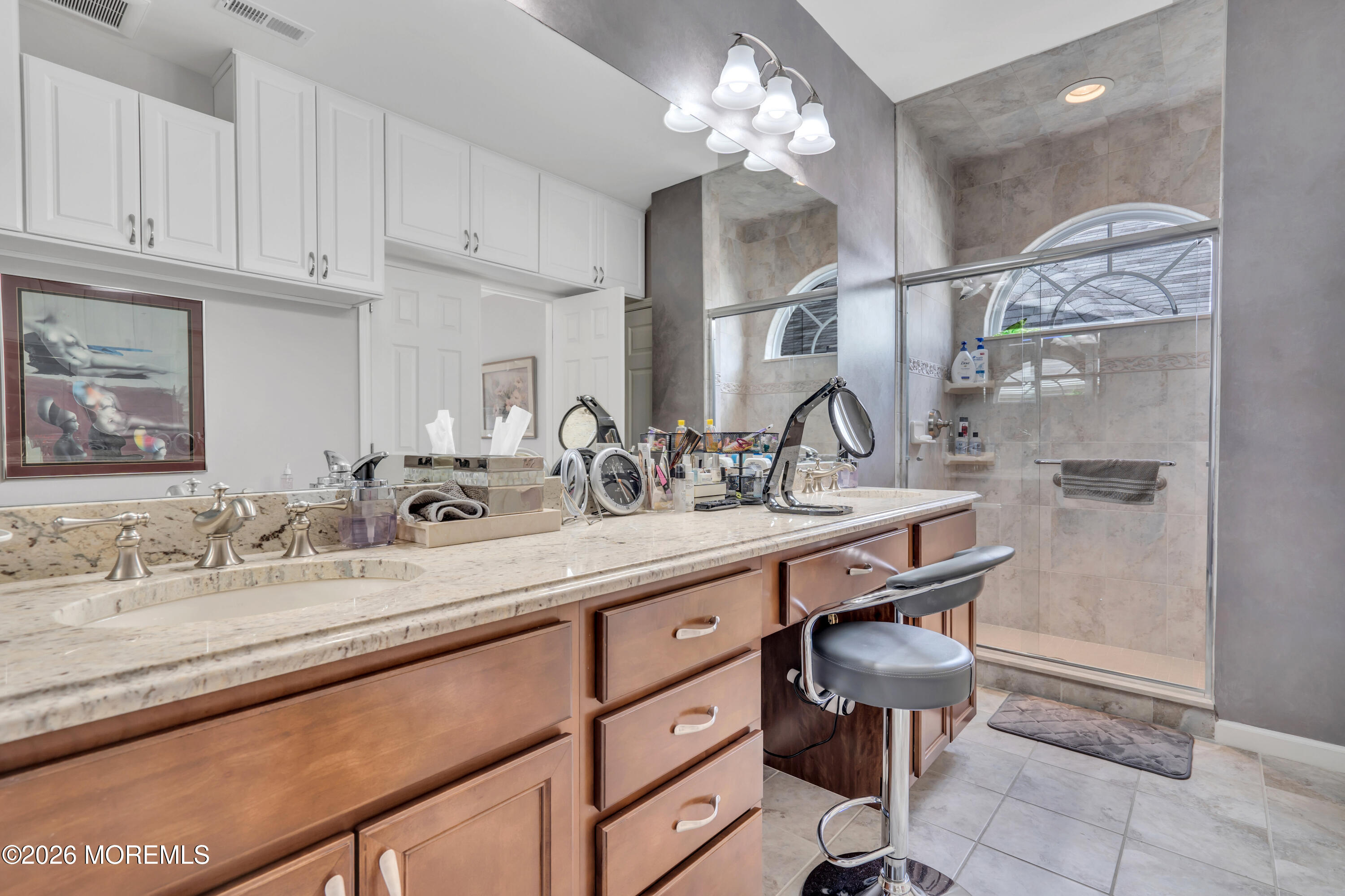 15 Enclave Boulevard Lakewood, NJ 08701 - Photo 26 of 81 a bathroom with a sink double vanity and a mirror
