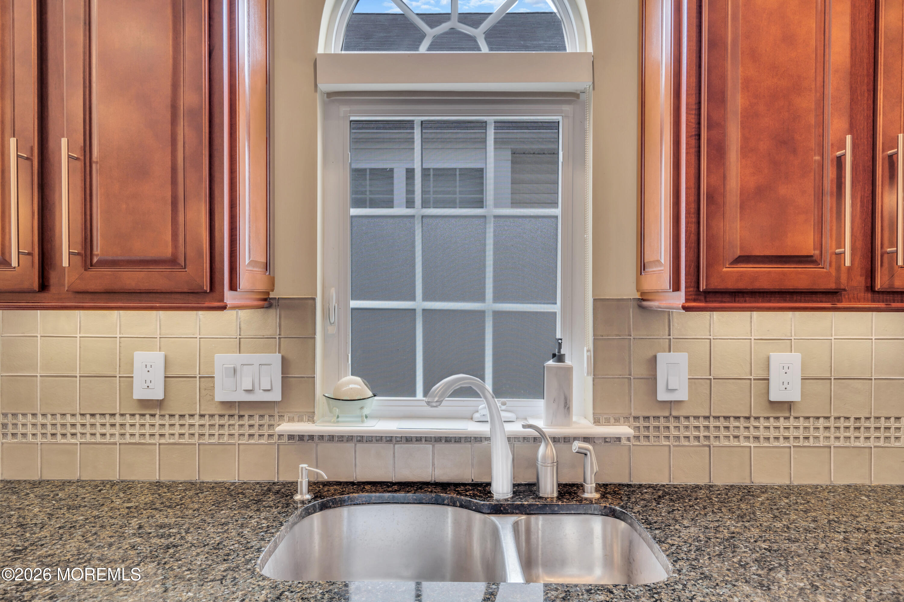 15 Enclave Boulevard Lakewood, NJ 08701 - Photo 28 of 81 a view of a kitchen with granite countertop a sink and a window