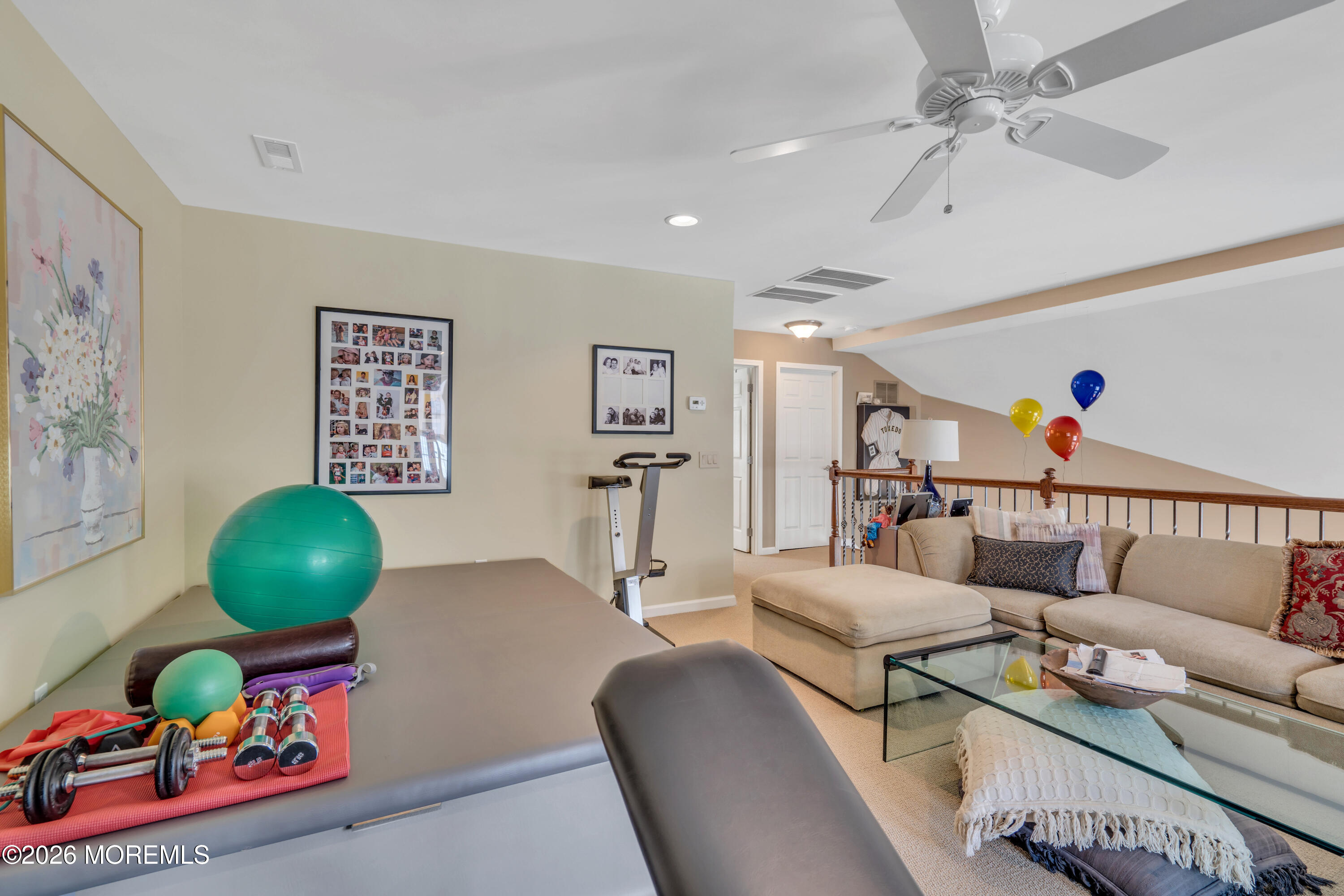15 Enclave Boulevard Lakewood, NJ 08701 - Photo 47 of 81 a living room with furniture and a wooden floor