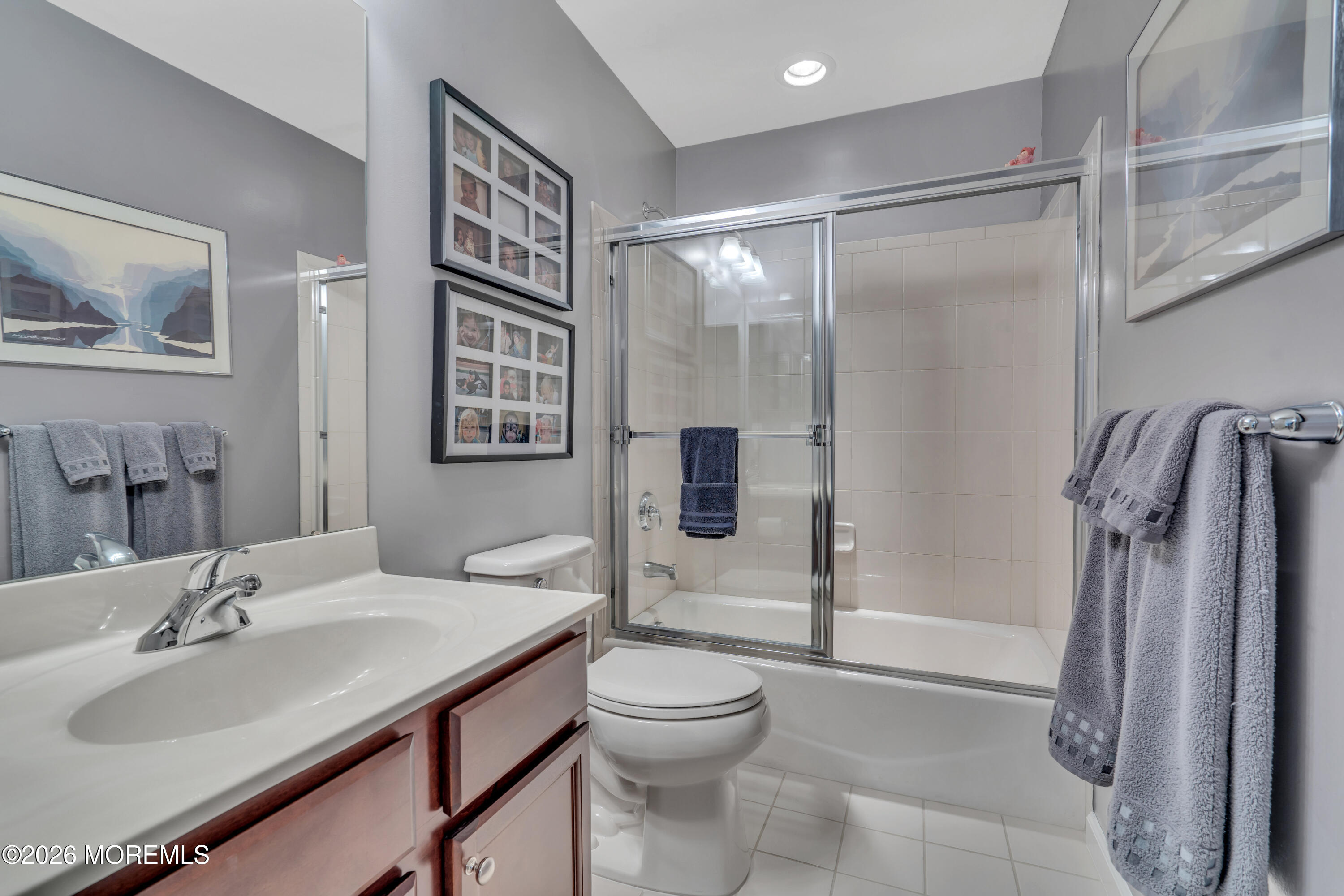 15 Enclave Boulevard Lakewood, NJ 08701 - Photo 53 of 81 a bathroom with a sink toilet and shower