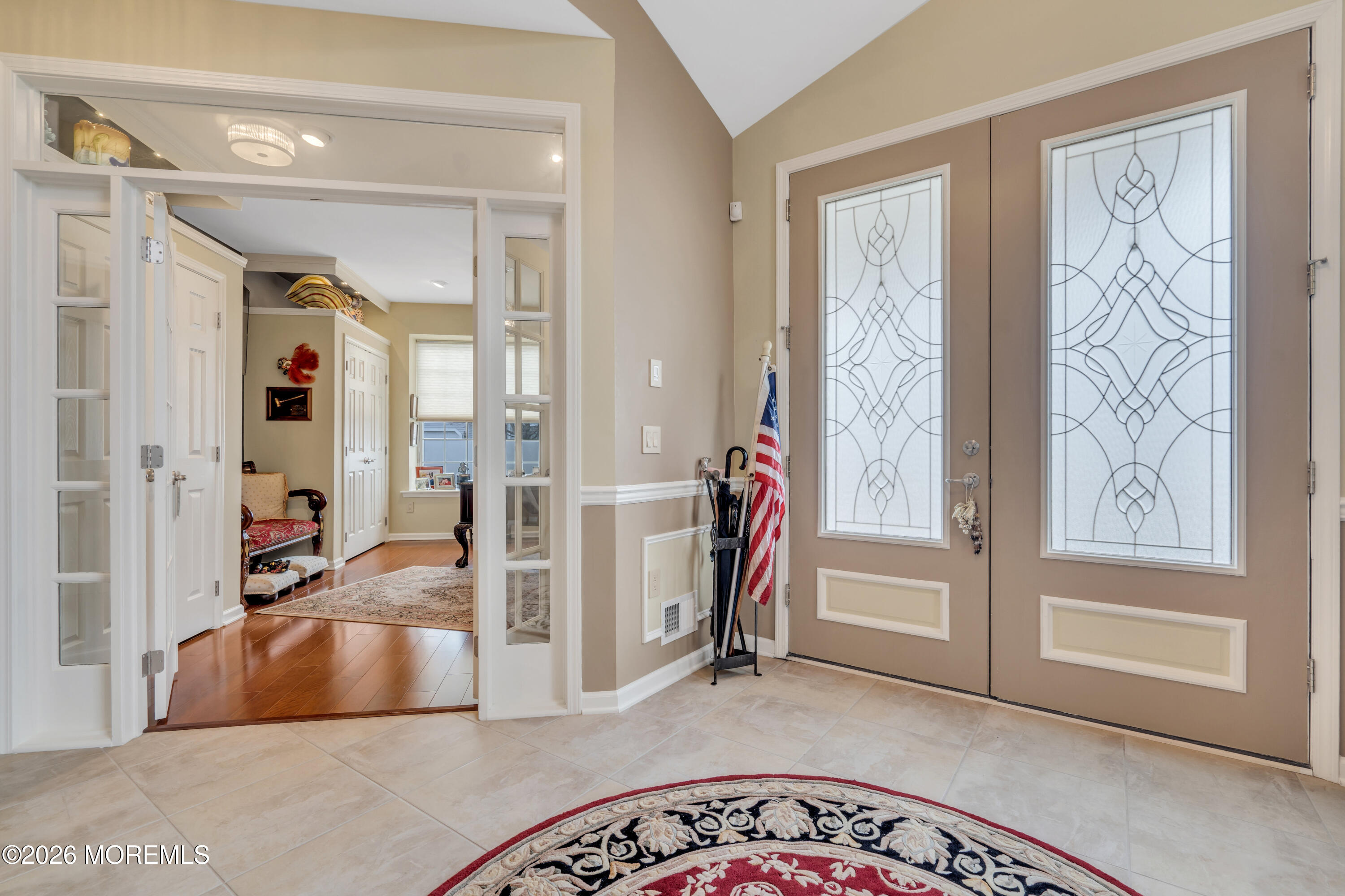 15 Enclave Boulevard Lakewood, NJ 08701 - Photo 6 of 81 a living room with furniture and a floor to ceiling window