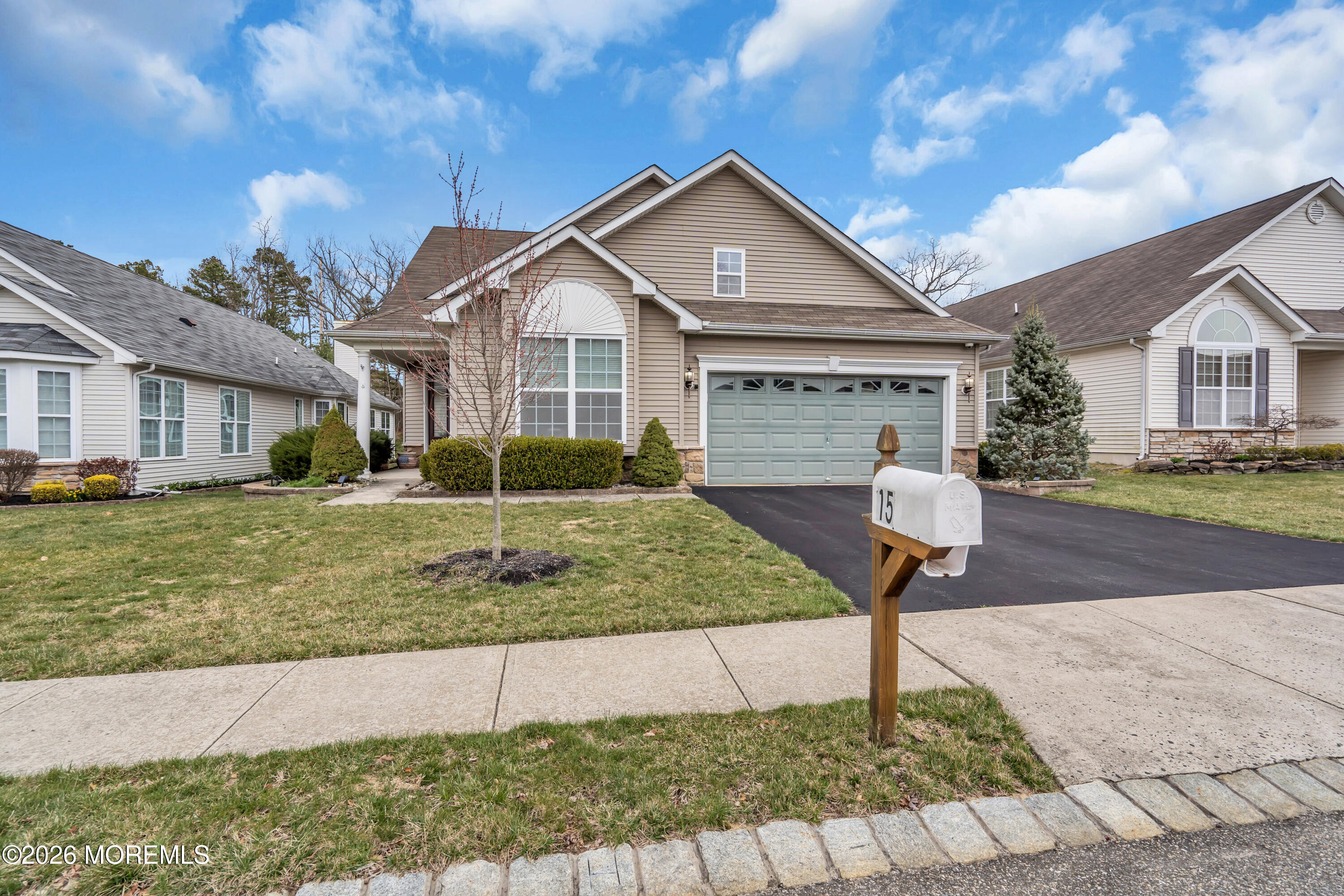 15 Enclave Boulevard Lakewood, NJ 08701 - Photo 79 of 81 a front view of a house with a yard