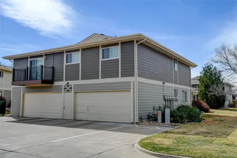 a front view of a house with a garage