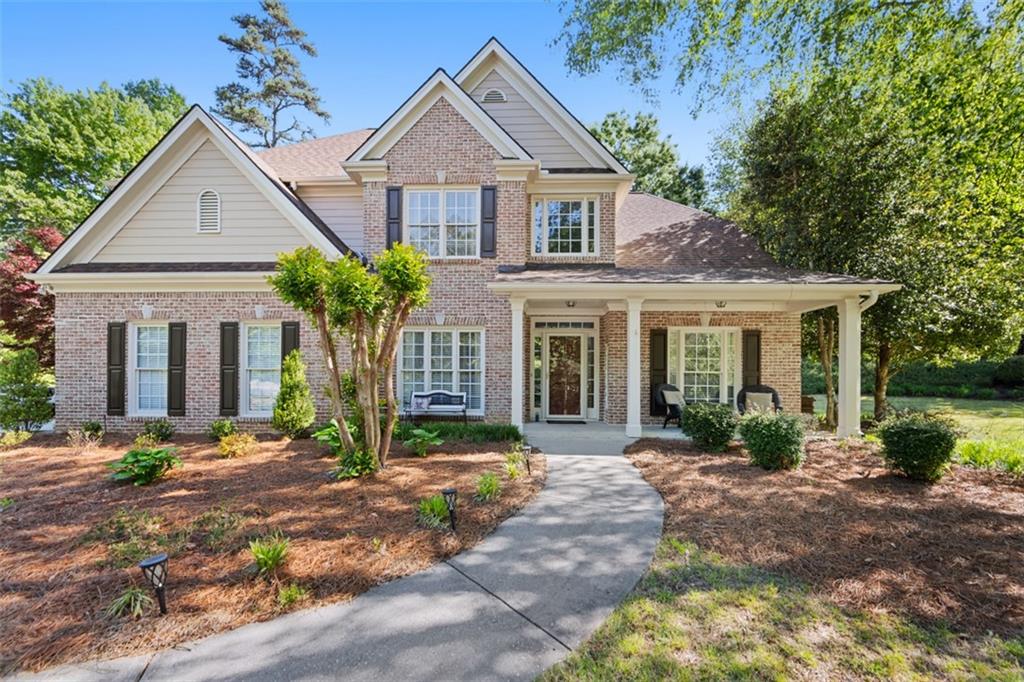 510 Senators Ridge Drive Dallas, GA 30132 - Photo 1 of 1 a front view of a house with garden