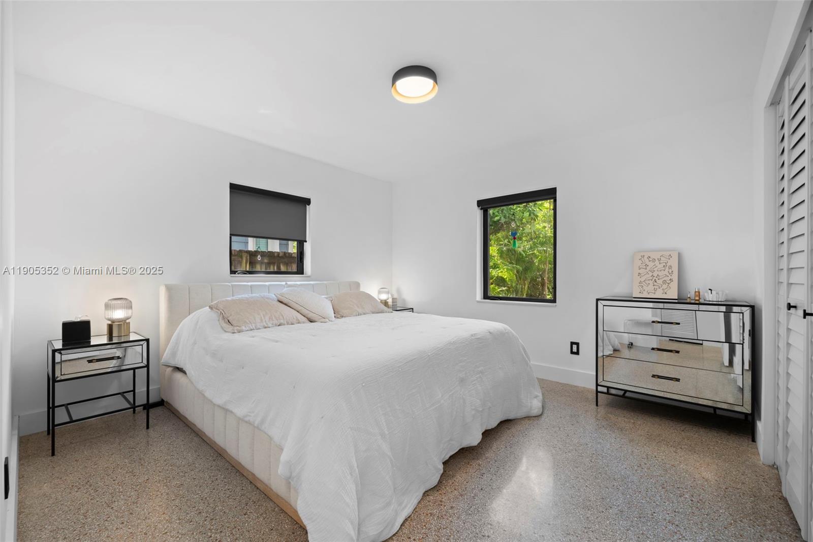 829 Southwest 4th Court Fort Lauderdale, FL 33312 - Photo 6 of 12 a bedroom with a bed and a closet