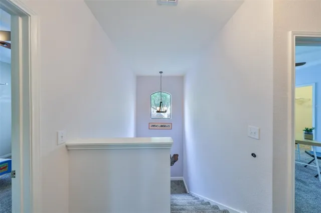 a view of an entryway with kitchen