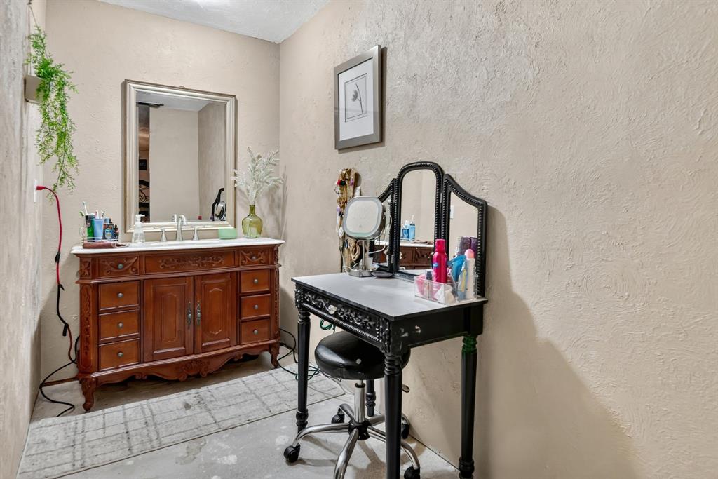 511 Salt Creek Road Poolville, TX 76487 - Photo 21 of 29 a view of a workspace with furniture