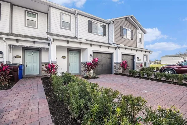 a front view of a house with an outdoor space