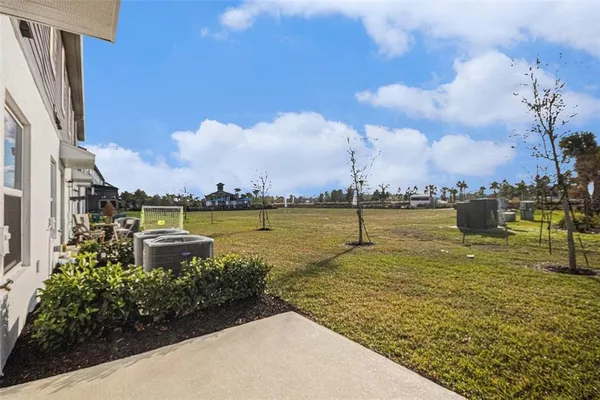 a view of a ocean with a building in the background