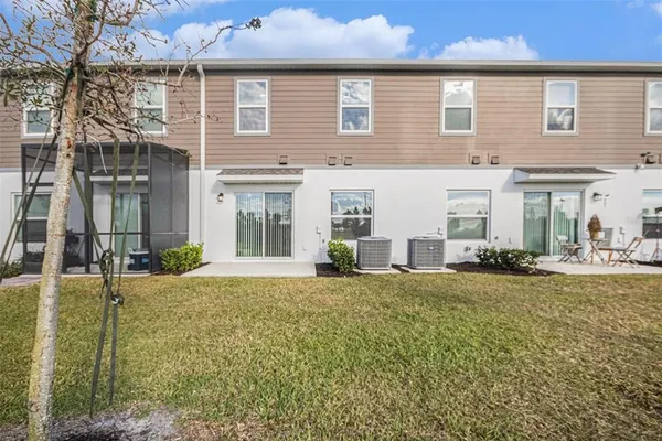front view of a house with a patio