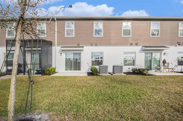front view of a house with a patio