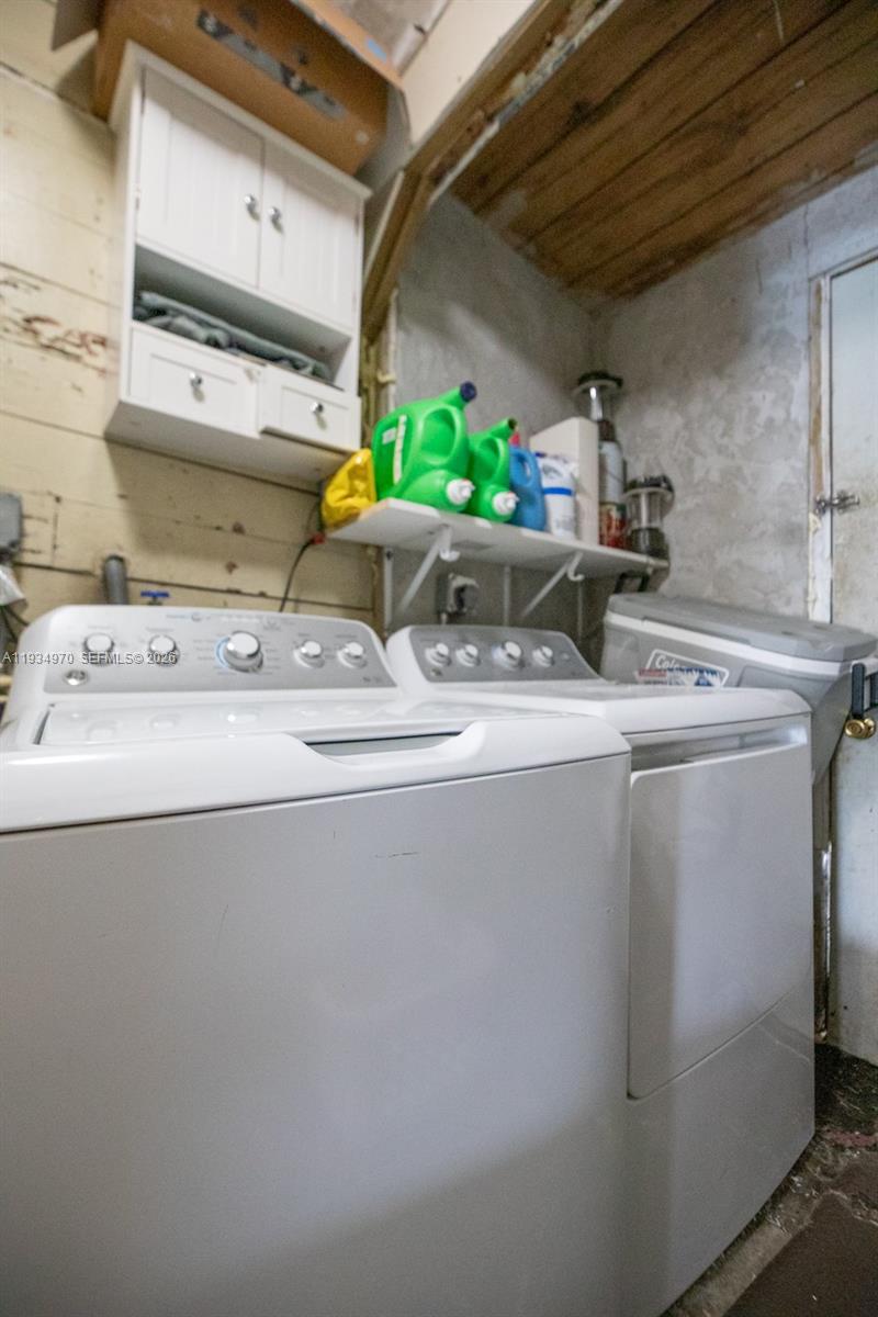 1911 Northwest 52nd Street Miami, FL 33142 - Photo 24 of 48 a utility room with dryer and washer