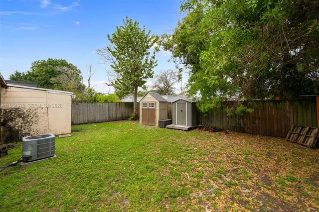 a view of a backyard with a garden