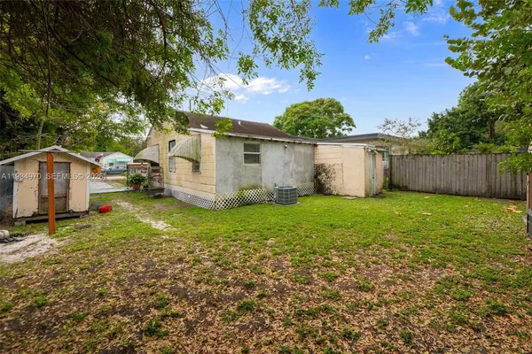 a view of a backyard with a garden