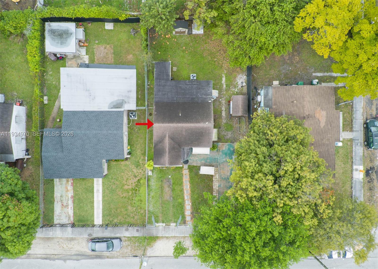 1911 Northwest 52nd Street Miami, FL 33142 - Photo 44 of 48 an aerial view of a house with a yard