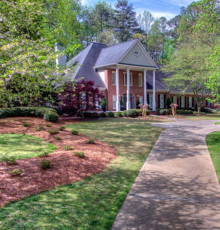 630 Heards Ferry Road Northwest Atlanta, GA 30328 - Photo 1 of 1 Traditional brick home, nestled in a park-like setting!