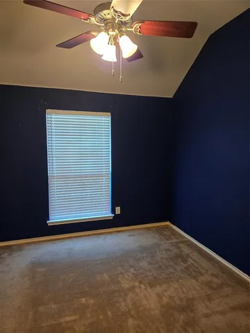a bathroom with a toilet a sink and shower
