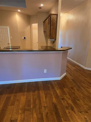 a view of a livingroom with furniture