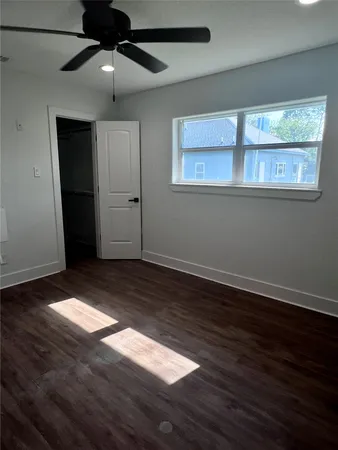 a view of an empty walk in closet