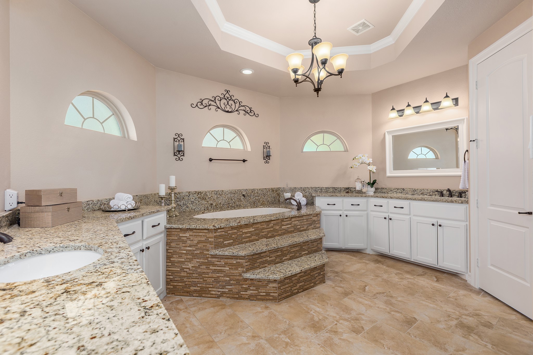 27688 Rio Blanco Drive Splendora, TX 77372 - Photo 24 of 50 a spacious bathroom with a granite countertop sink mirror and vanity