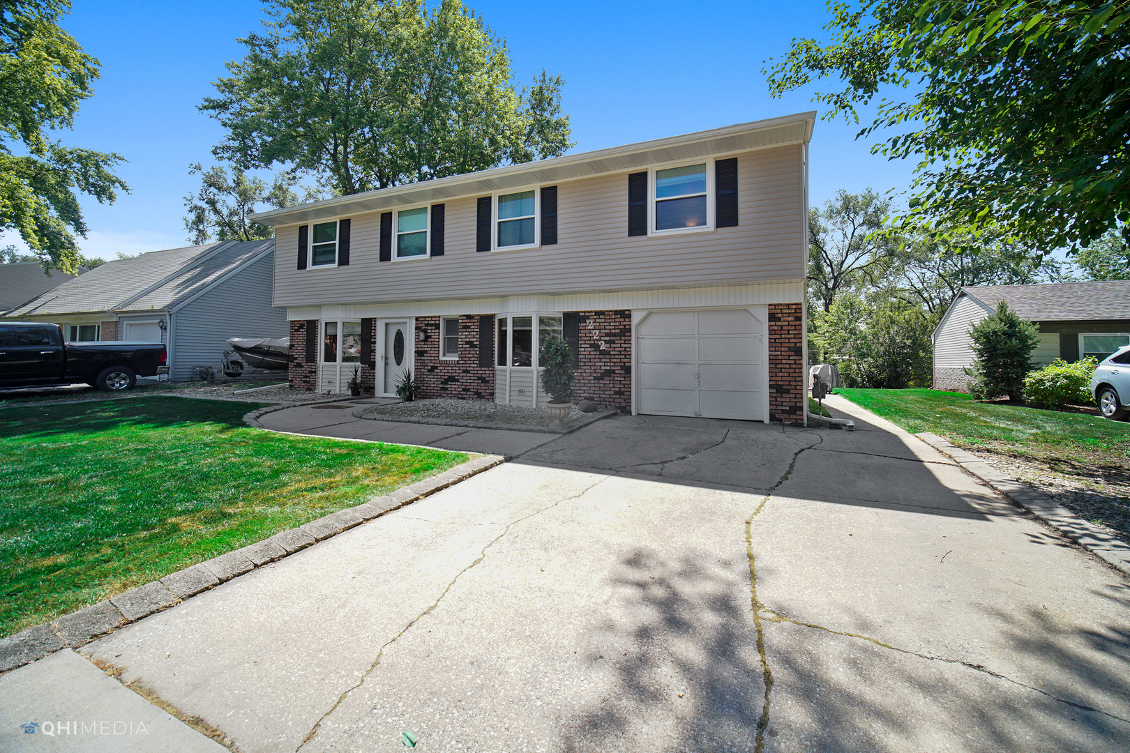 222 Thornhurst Road Bolingbrook, IL 60440 - Photo 2 of 22 a front view of house with yard and green space