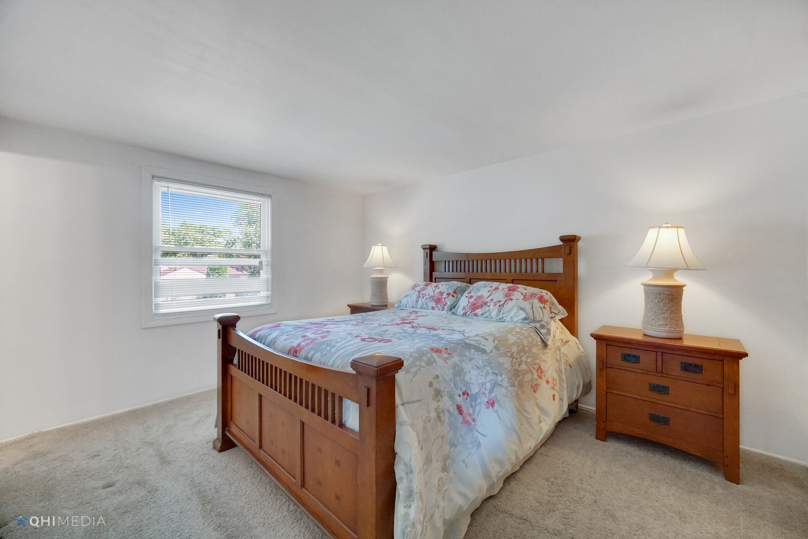 222 Thornhurst Road Bolingbrook, IL 60440 - Photo 13 of 22 a bedroom with a bed and a lamp on dresser