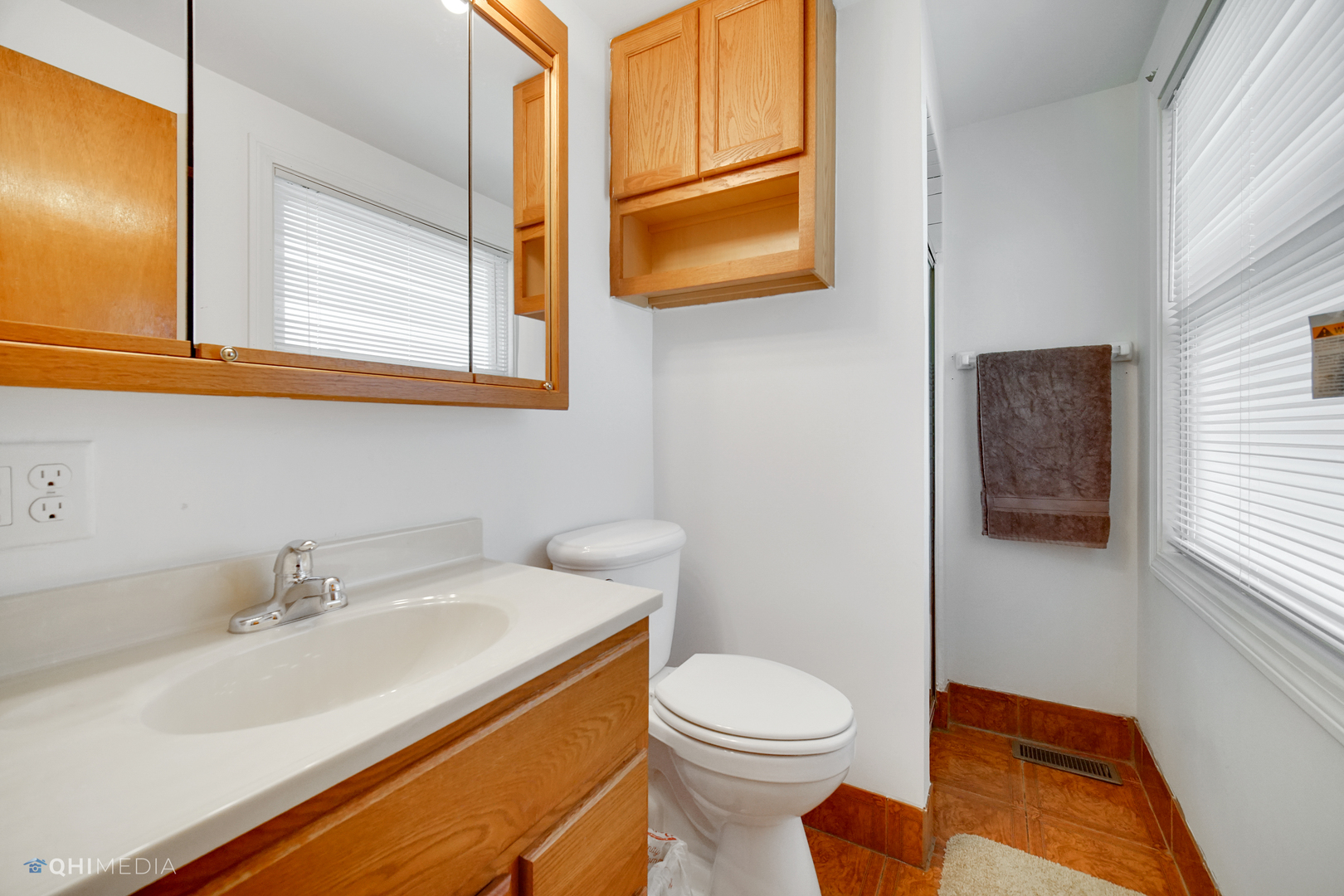 222 Thornhurst Road Bolingbrook, IL 60440 - Photo 15 of 22 a bathroom with a sink and a toilet