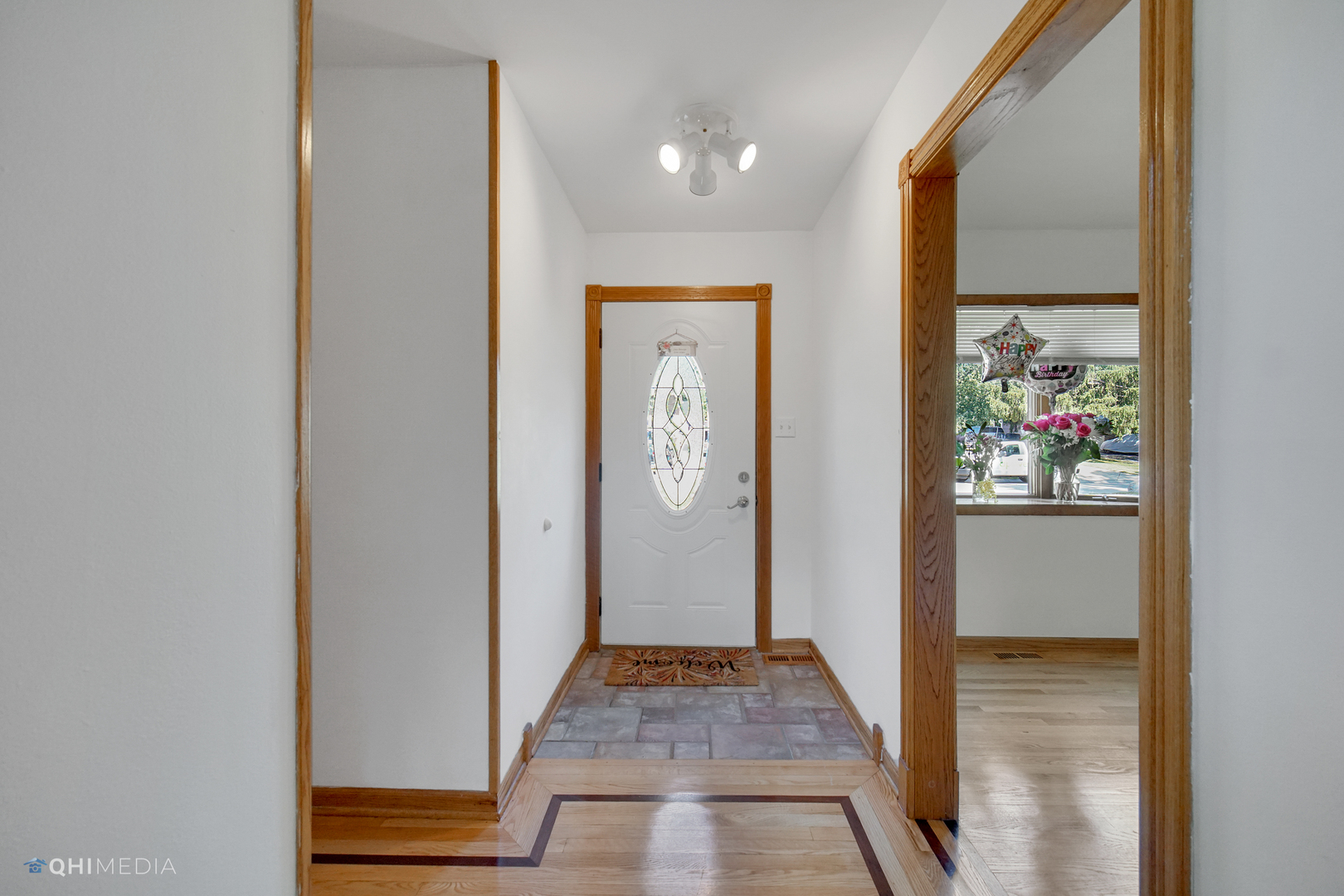 222 Thornhurst Road Bolingbrook, IL 60440 - Photo 3 of 22 a view of hallway with wooden floor