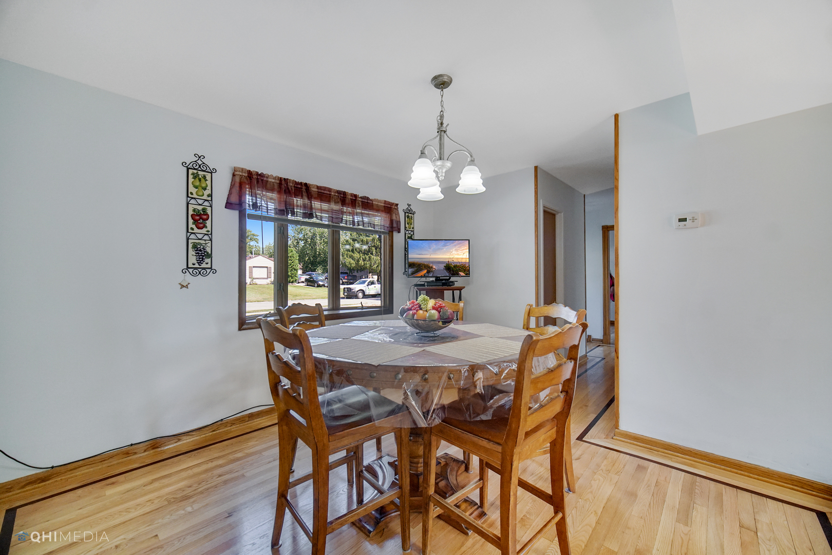 222 Thornhurst Road Bolingbrook, IL 60440 - Photo 9 of 22 a view of a dining room with furniture and window