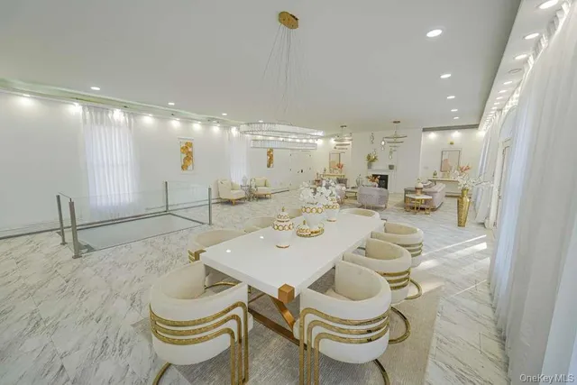 a bathroom with a sink mirror and toilet