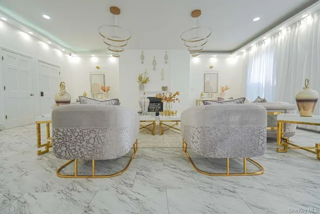 a living room with lots of furniture and gym equipment