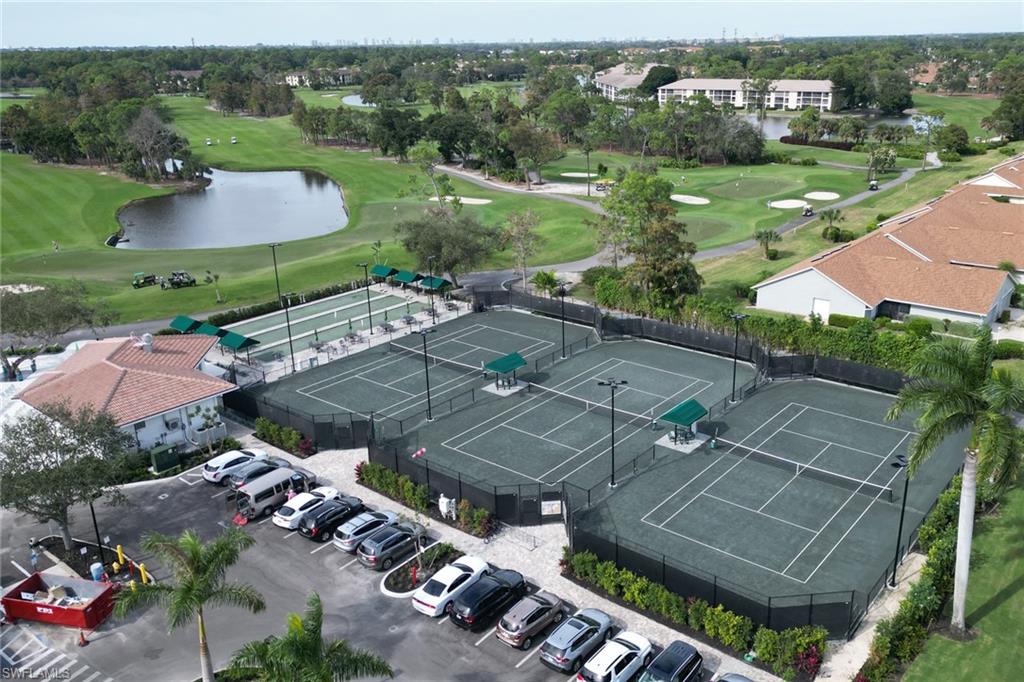 1025 Foxfire Lane, Unit 110 Naples, FL 34104 - Photo 46 of 48 an aerial view of multiple house