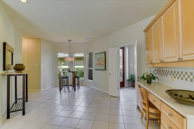 a kitchen that has a sink and a stove