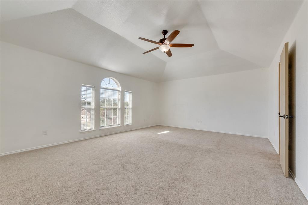 2701 Wildridge Court Fort Worth, TX 76108 - Photo 12 of 26 a view of an empty room with a window