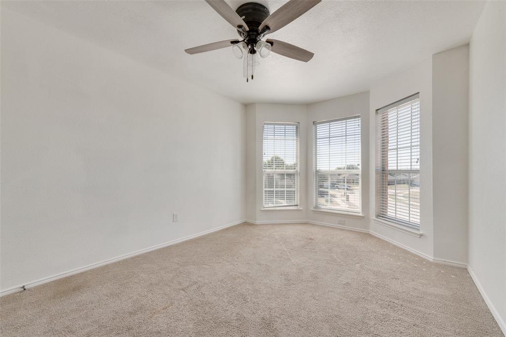 2701 Wildridge Court Fort Worth, TX 76108 - Photo 17 of 26 a view of an empty room with a window