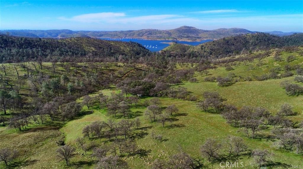 160 Cotton Creek Road Mariposa, CA 95338 - Photo 11 of 22 a view of a lush green hillside and a mountain