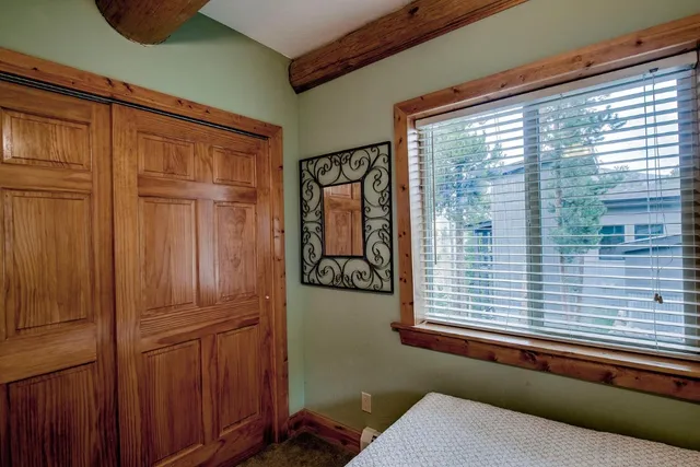 a view of a door and chair in a room