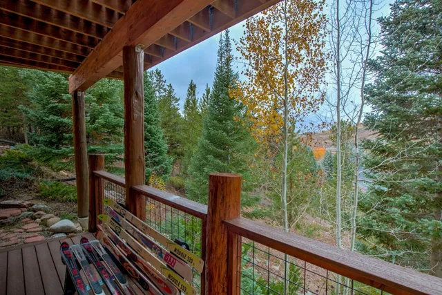 a view of a balcony with wooden floor