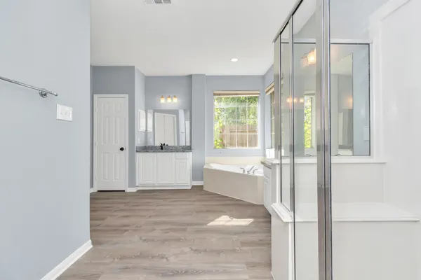 a view of an empty room and window